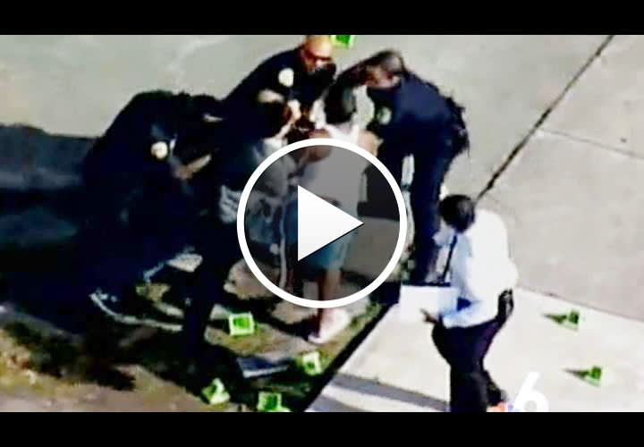 Video: Victim's Family Fights with Cops at Crime Scene