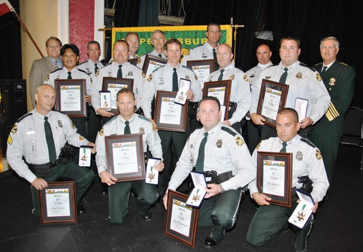 Officers Rescue Wounded Comrades Trapped In House with Armed Fugitive