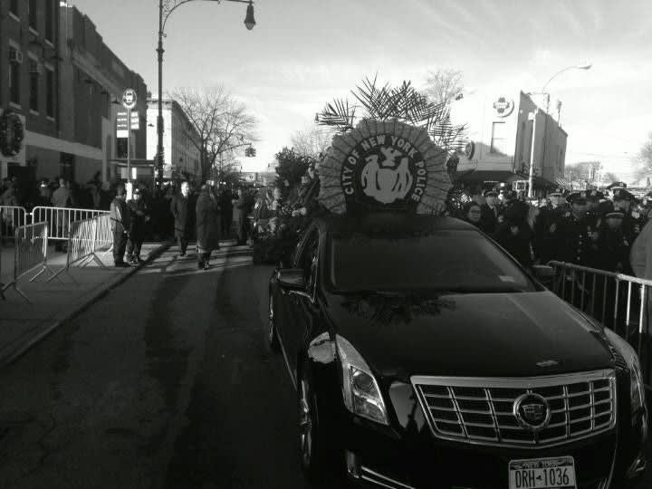 Thousands Attend Funeral for Slain NYPD Officer
