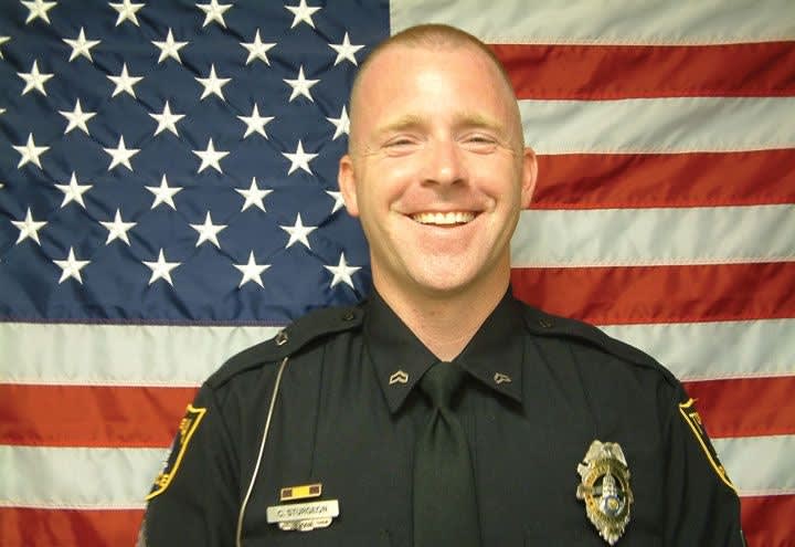 Kansas Officers Save Woman From Burning Building