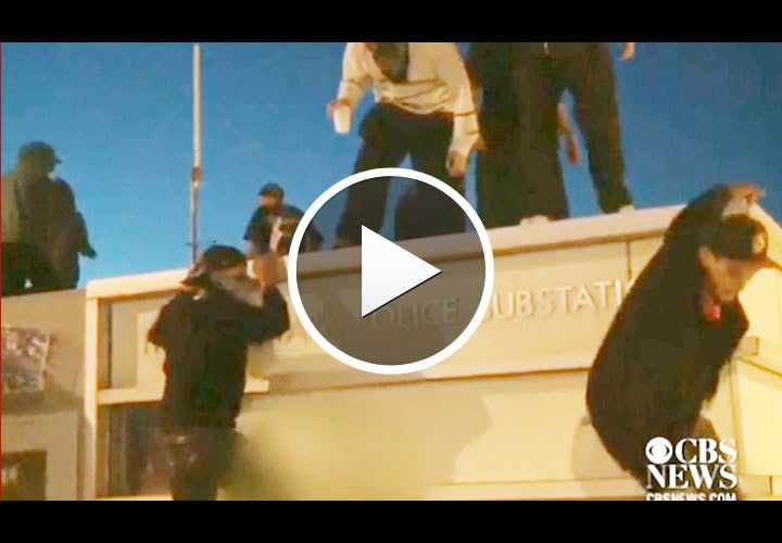 Video: Protesters Clash with Police Over Albuquerque PD Shootings