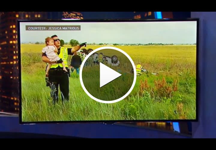 Video: Colorado Officer Comforts Toddler After Her Father was Killed in Crash