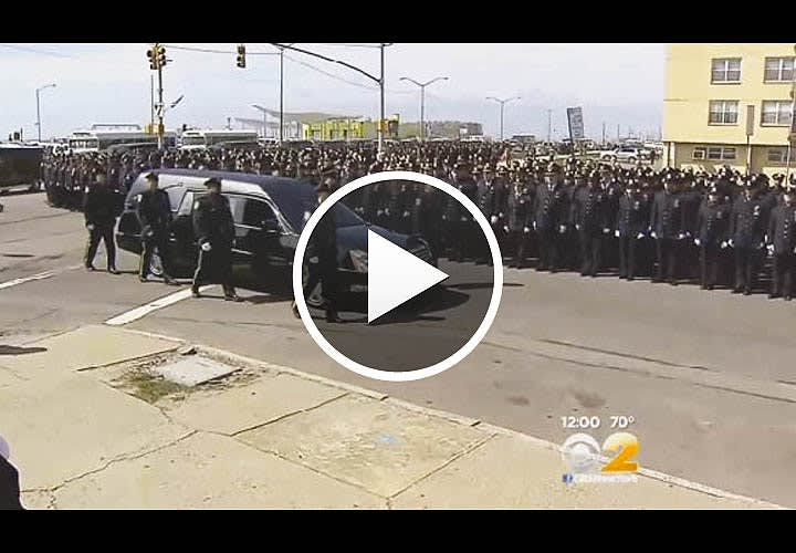 Video: Thousands Honor NYPD Officer Killed by Suspected Arson Fire