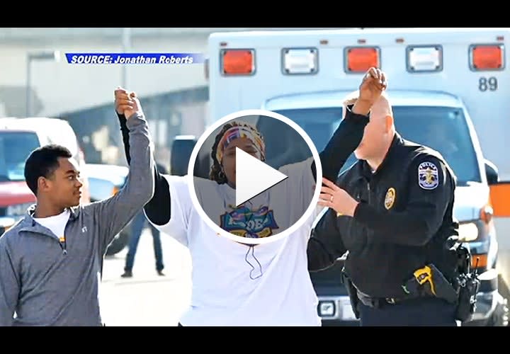Video: Kentucky Officer Helps Determined Woman Finish 10K Run