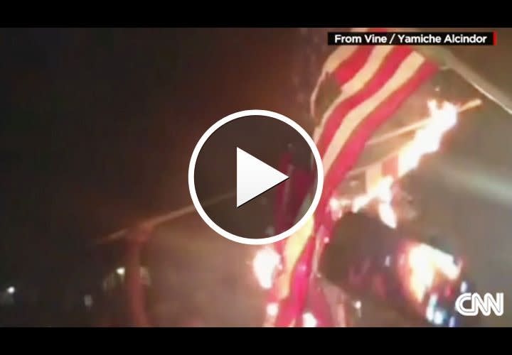 Video: Protesters Burn Flag After Police Shooting in St. Louis
