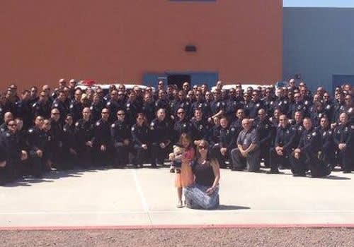 100 Officers Attend Fallen Cop's Daughter's Graduation