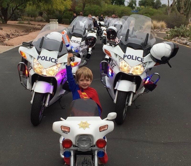 Tiny Super Police Supporter Joins Phoenix PD Motorcade