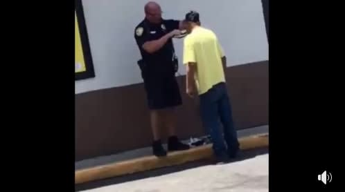 Florida Officer Shaves Homeless Man's Beard to Help Him Get Job
