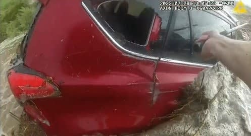 AZ Officers Rescue Woman from Vehicle Trapped in Flood Waters