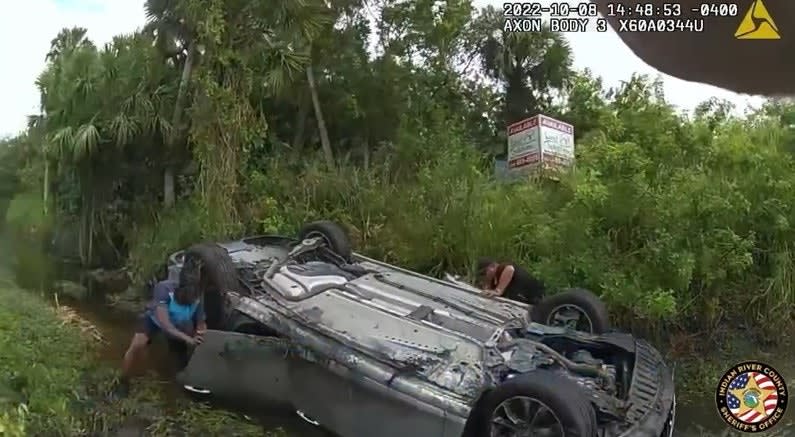 FL Deputies Rescue 3 from Overturned Car in Canal