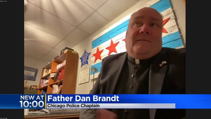 Chicago Police Chaplain Helps Rescue Man from Overturned Car