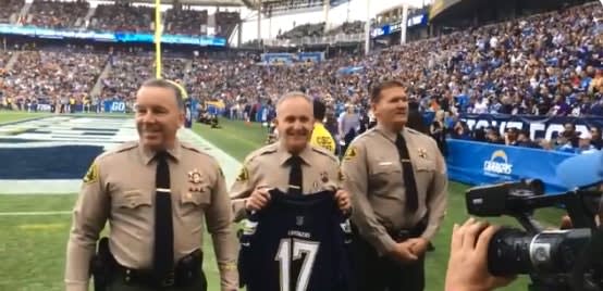NFL Team Honors Deputies who Rescued 96-Year-Old Woman from Wildfire