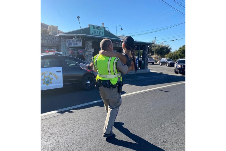 California Highway Patrol Officer Carries Runner to Finish Line