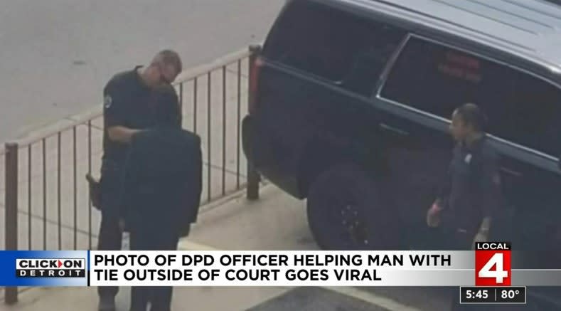 Detroit Officer Praised for Helping Young Man Tie His Necktie