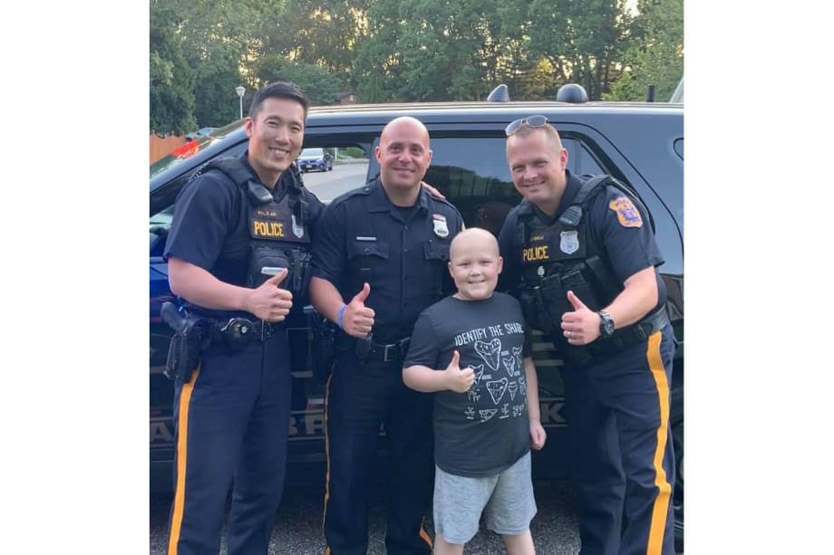 New Jersey Police Officers Visit Boy Battling Rare form of Cancer