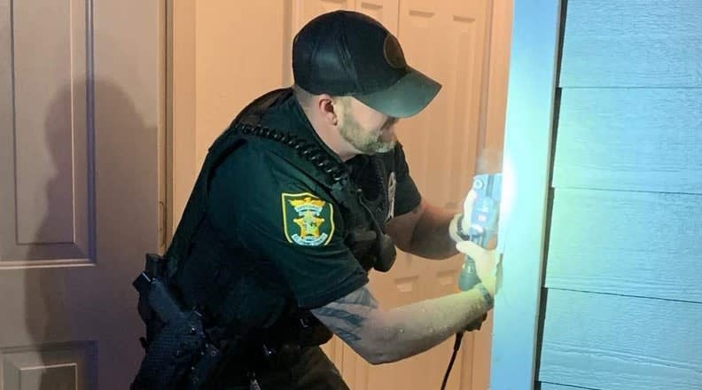 FL Deputy Repairs Woman's Door Breached During Service Call