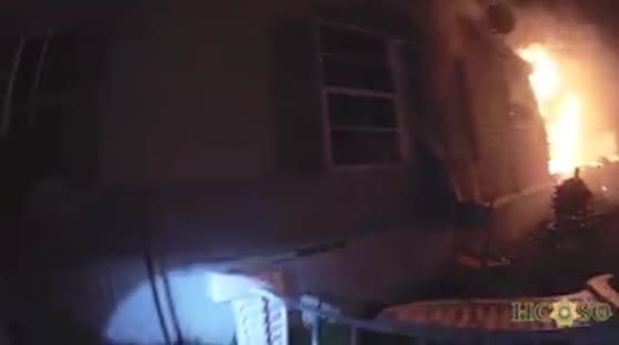 Video: Texas Deputy Pulls Elderly Woman from Burning Home