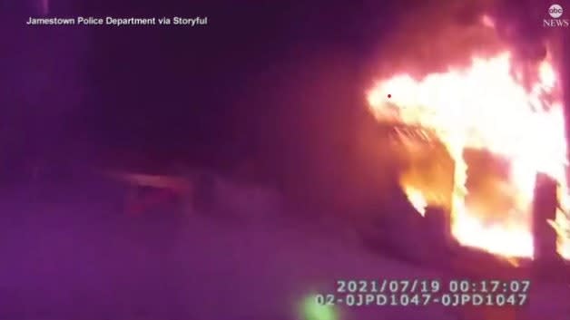 NY Officer Catches People Jumping from Second Floor of Burning Home