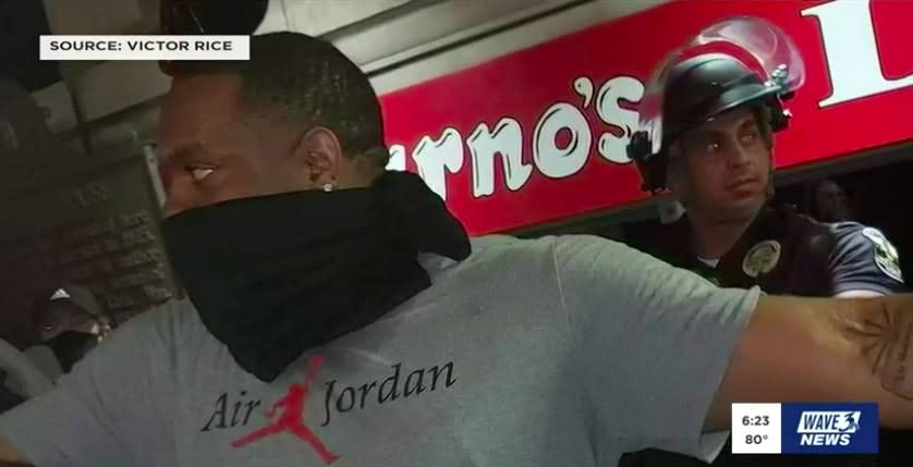 Protesters Protect Solo Louisville Officer from Angry Mob