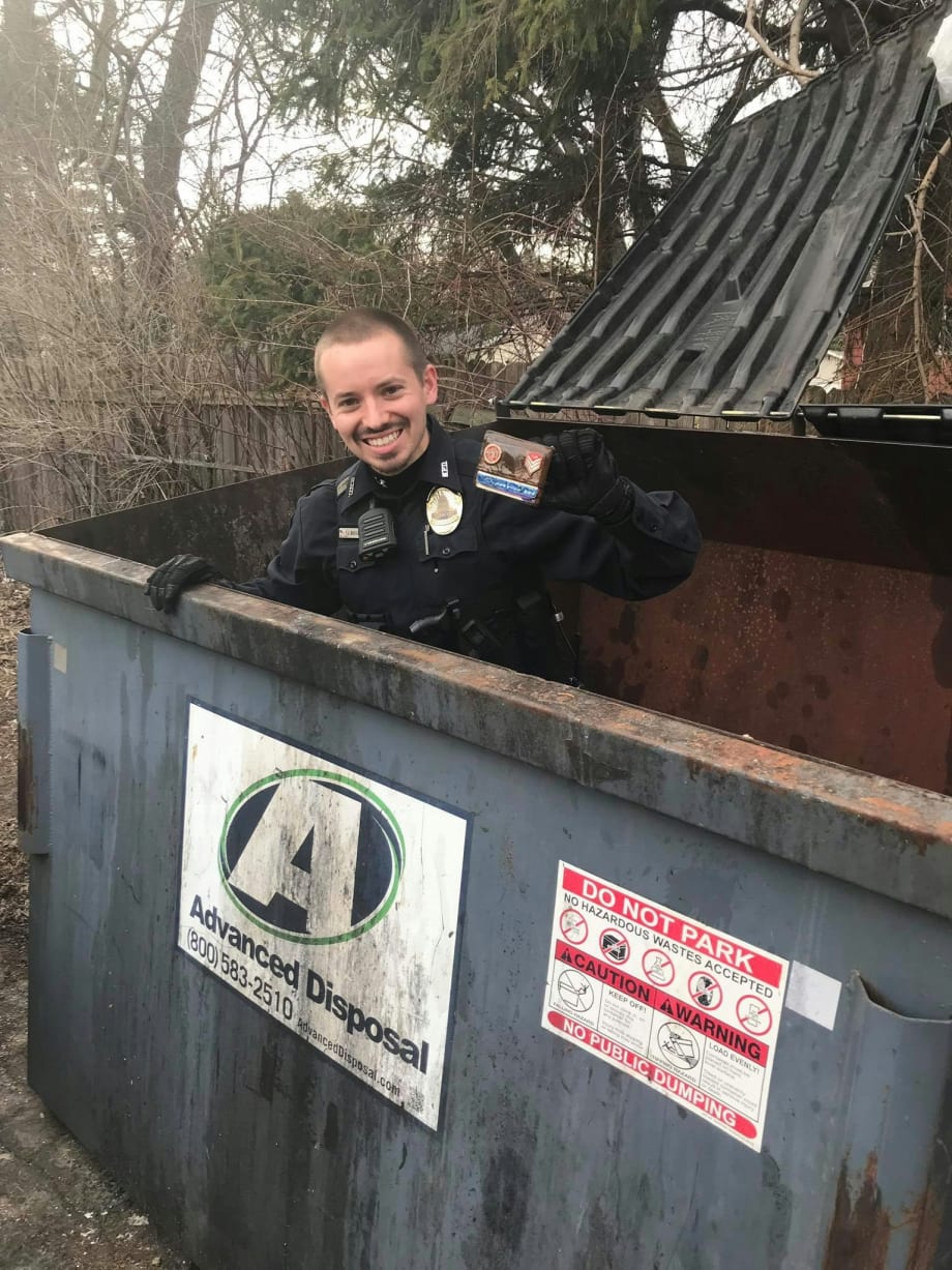 Wisconsin Officer Dumpster Dives to Find Marine Veteran's Missing Wallet