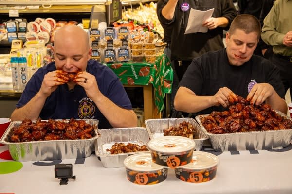 Connecticut Officer, Firefighter Square Off in Chicken Wing Eating Contest
