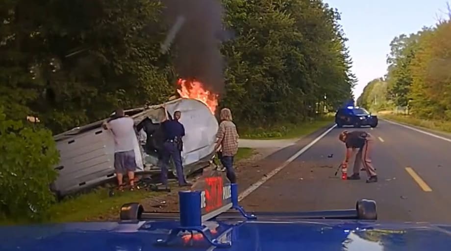 MI Dashcam Shows Trooper Helping Woman Trapped in Burning Car