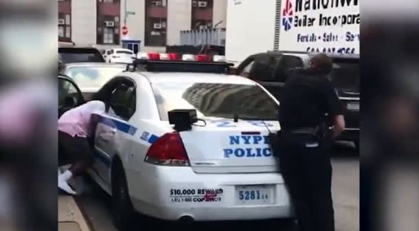 Video: Good Samaritans Help NYPD Officer Free Hand Stuck in Squad Trunk