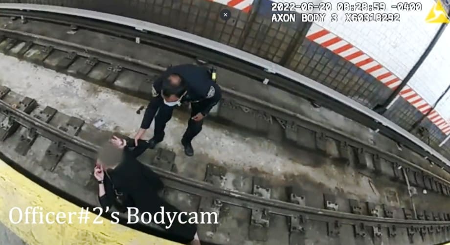 NYPD Officers Save Woman Who Collapsed onto Subway Tracks