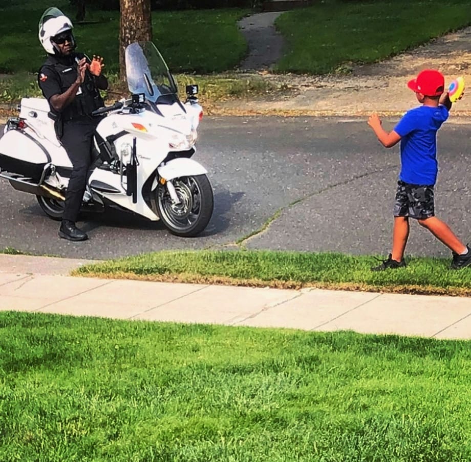 Washington Officer Lauded for Taking Time to Play with Young Boy