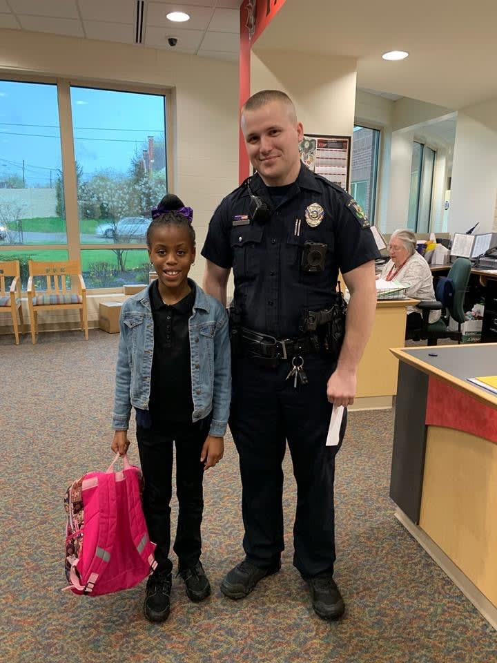 Officer Escorts Child to "Father/Student" Day at School on Behalf of Deployed Soldier