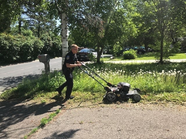 Minnesota Officer Conducts Welfare Check, then Mows Elderly Woman's Lawn