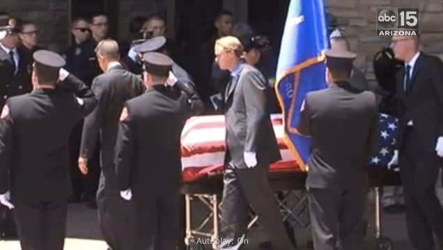 Video: Fallen Phoenix Officer Remembered as "Larger than Life"
