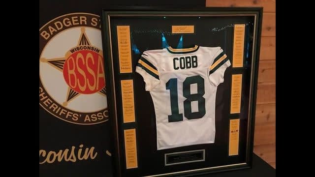 Family of Slain WI Deputy Receives Signed Packers Jersey, Honored by Sheriffs' Association