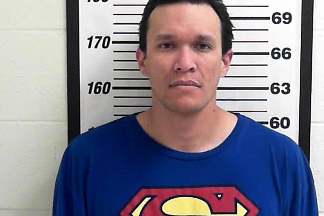 Christopher Reeves Busted Wearing Superman Shirt