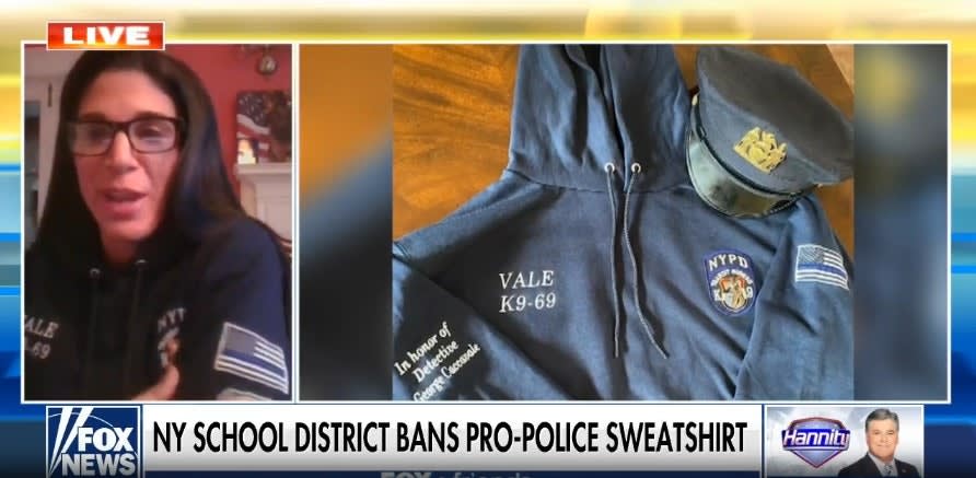 Daughter of Slain Officer Fights School District Over Banning of "Thin Blue Line" Symbol