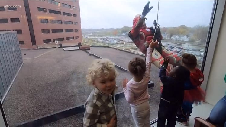 Toledo SWAT Officers Dress as Superheroes, Rappel Down Children's Hospital to Entertain Kids on Halloween