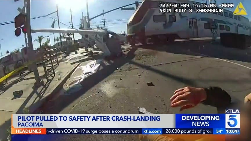 LAPD Officers Rescue Pilot Moments Before Crashed Plane Hit by Train