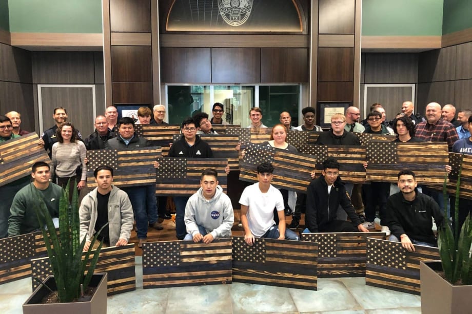 Texas Students Donate 98 Handmade "Thin Blue Line Flag" Carvings to Department