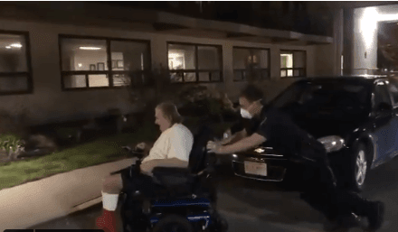 Massachusetts Officer Pushes Man Home Whose Electric Scooter Had Died