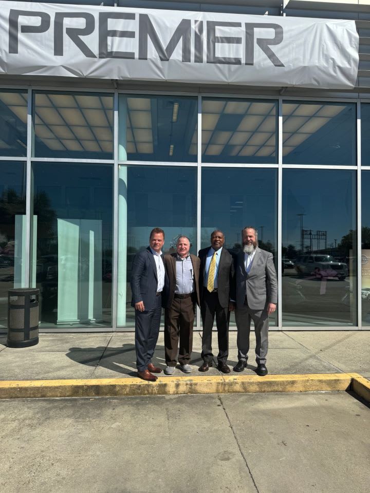 Auto Group Expands With Buys