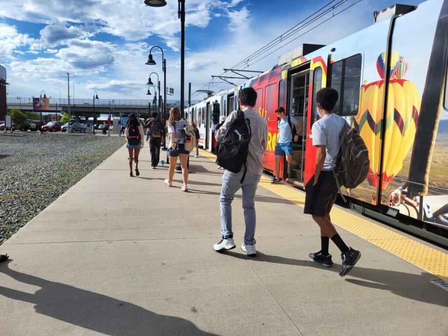 Young people on a Denver RTD railcar.