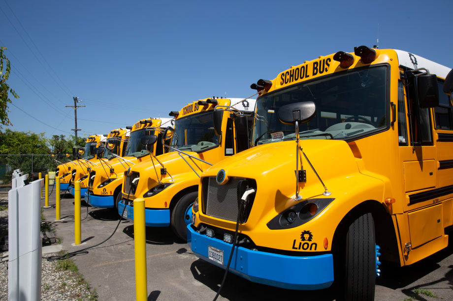 California School Children Ride in Green School Buses
