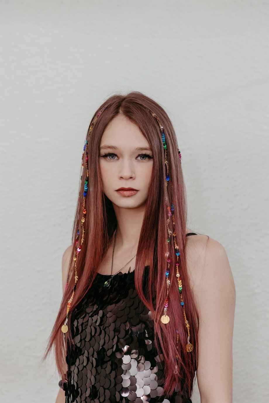 A young woman with long hair.