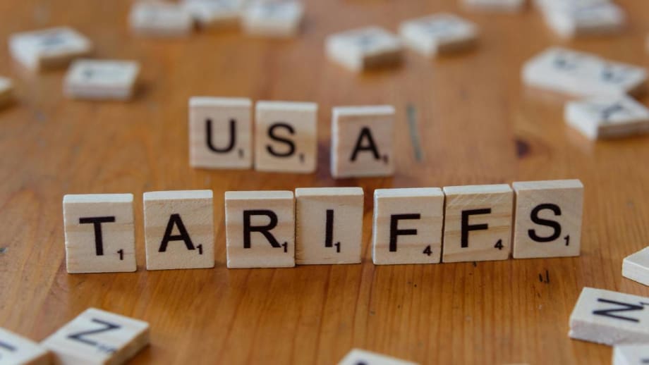 Scrabble pieces spelling out USA Tariffs.