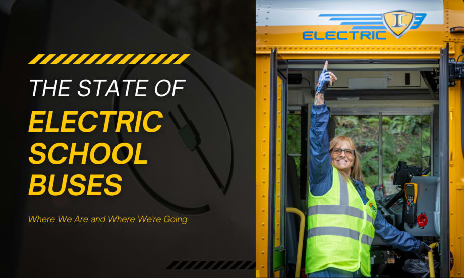 Bus driver in safety vest gives a thumbs-up in the doorway of an IC electric school bus