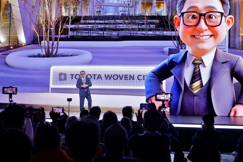 Toyota executive delivers an on-stage address.