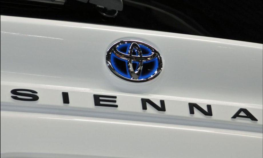 Closeup of the Toyota Sienna logo.