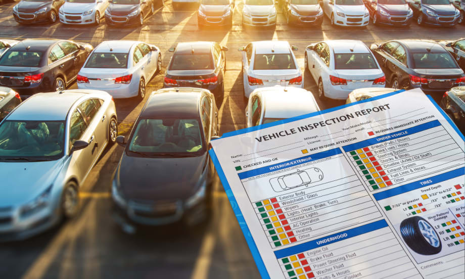 vehicles in parking lot with clipboard overlaid.