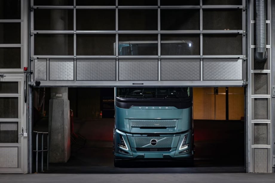 A Volvo FH Electric in a garage.