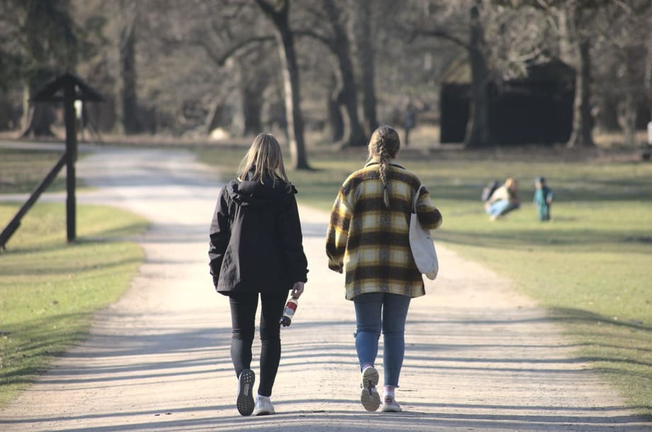 Two women walking.